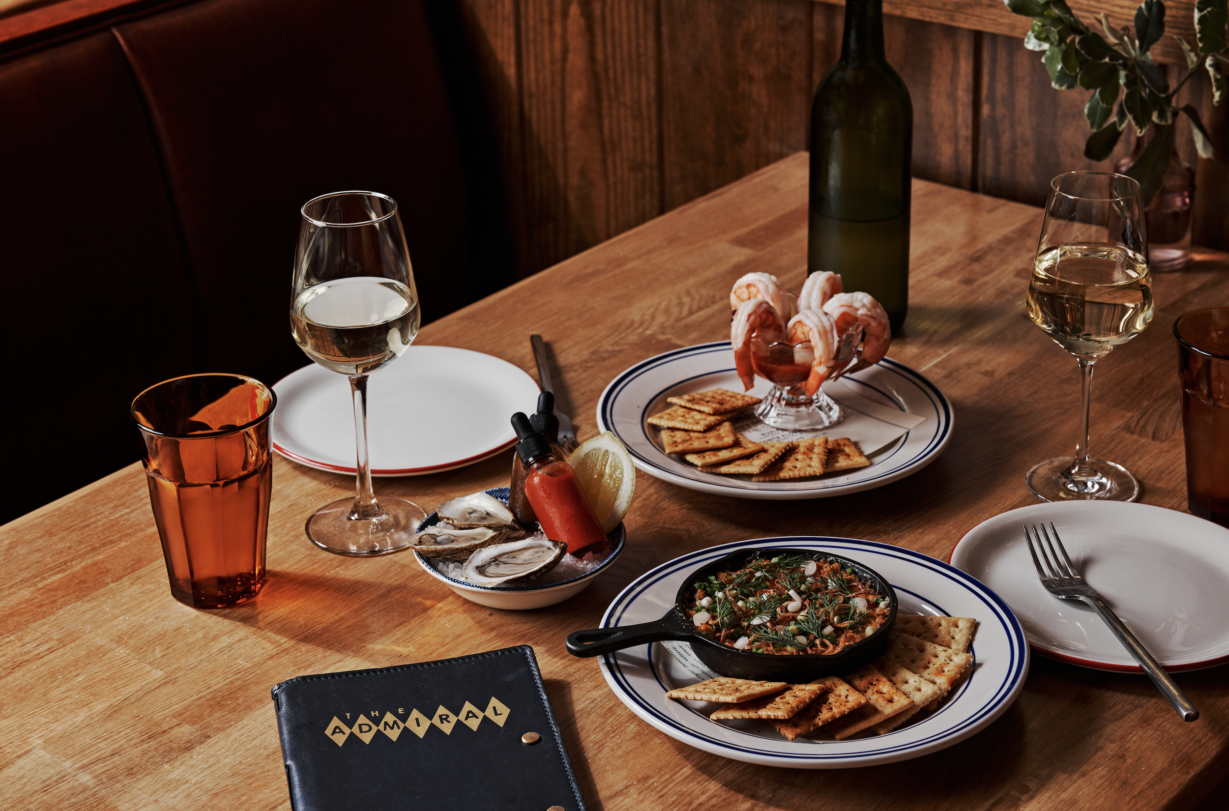 A dining table at The Admiral in West Asheville from the restaurant's official website